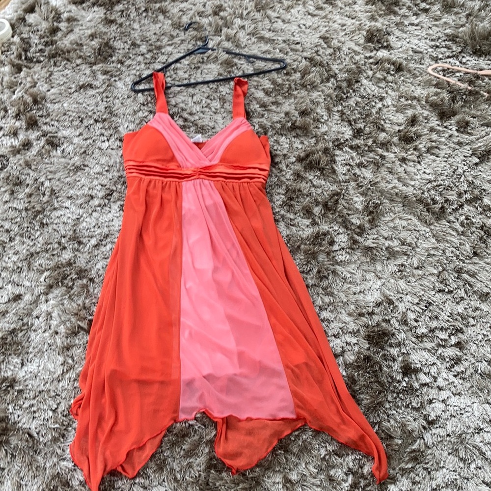 I love this dress orange and peach flowy and sexy!